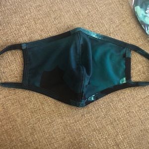 One Fabletics face mask. New in sealed bag.